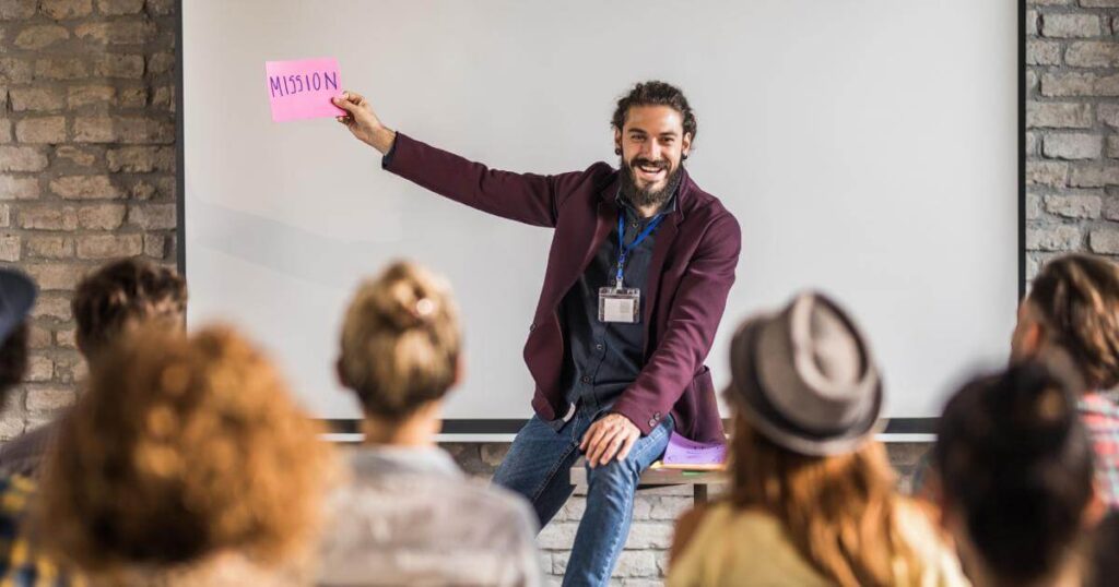 Employer presenting company mission to a team — how mission and values attract quality candidates