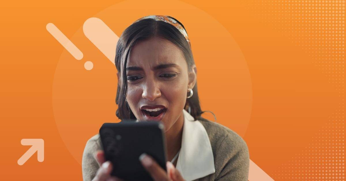 disgusted woman looking at scam job text on cell phone
