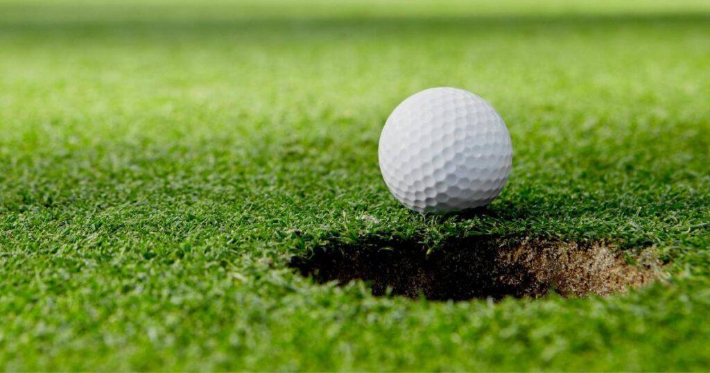 golf ball near hole